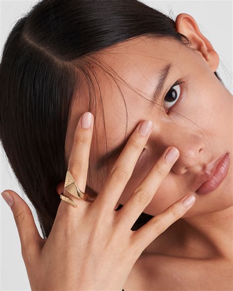 prada gold rings|ring with a teara prada.